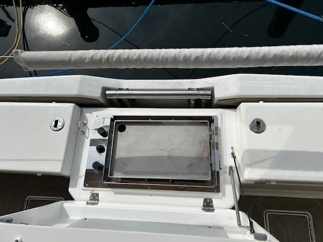 Sirene Yacht Photos Pics Dufour 390 GL 2019 yacht deck with built-in grill and storage compartments.