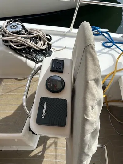 Sirene Yacht Photos Pics Cockpit of 2019 Dufour 390 GL sailboat with Raymarine equipment and coiled ropes.