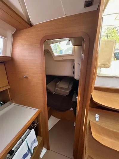 Sirene Yacht Photos Pics Interior view of 2019 Dufour 390 GL sailboat cabin with wooden finish.