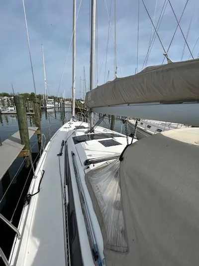 Sirene Yacht Photos Pics 2019 Dufour 390 GL sailboat docked at marina, showcasing deck and rigging.