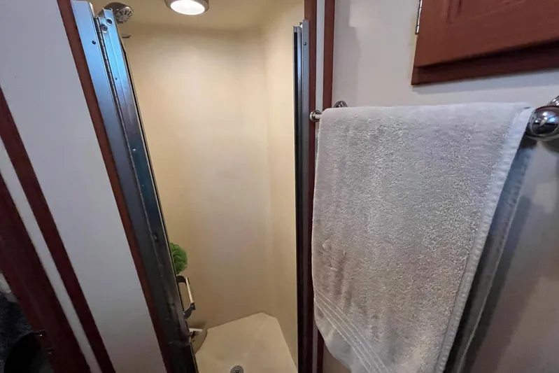 Dinky Dau Yacht Photos Pics Compact bathroom with towel rack in 2007 Nordic Tug 42 boat.