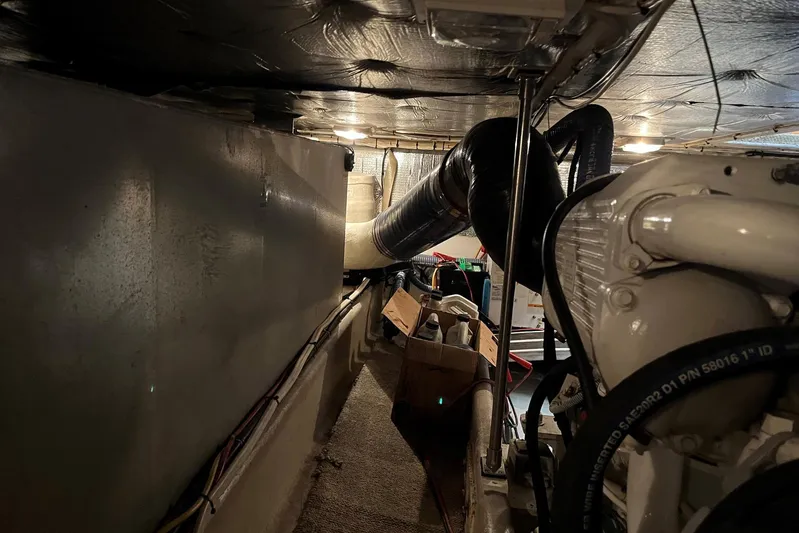 Dinky Dau Yacht Photos Pics Engine room of 2007 Nordic Tug 42 with visible machinery and ductwork.