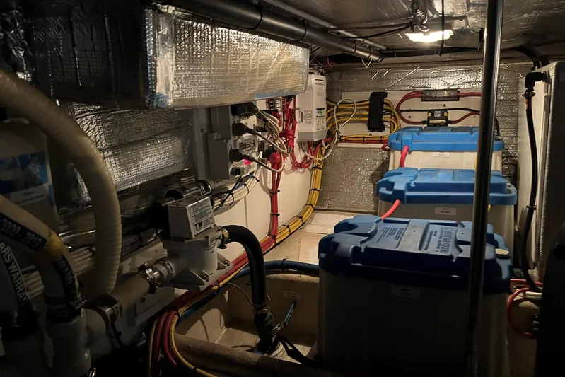 Dinky Dau Yacht Photos Pics Engine room of a 2007 Nordic Tug 42 with batteries and wiring.