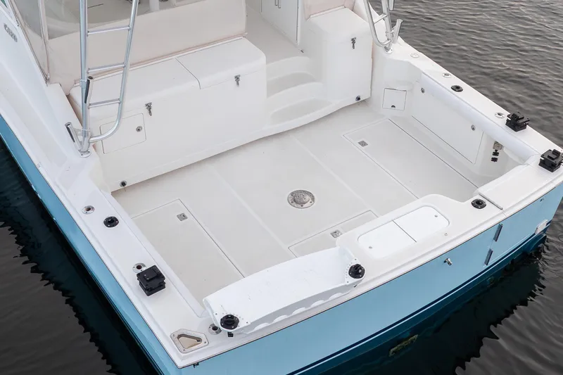  Yacht Photos Pics 2006 Cabo 40 Express boat deck with spacious layout and clean design.