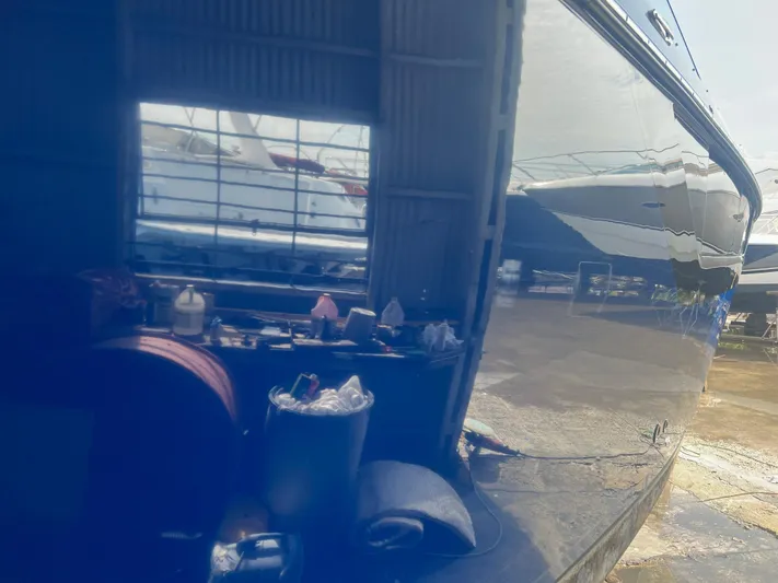  Yacht Photos Pics Reflection of a 2019 Monterey 378 Super Express yacht in a workshop.