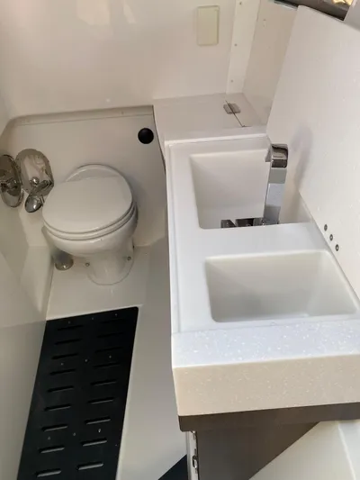  Yacht Photos Pics 2019 Monterey 378 Super Express boat bathroom with toilet and sink.