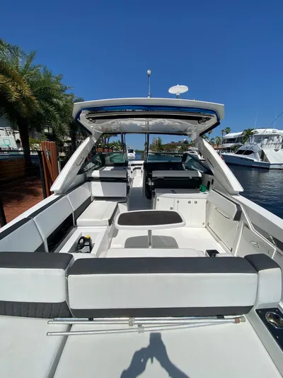  Yacht Photos Pics 2019 Monterey 378 Super Express boat interior with seating and open deck.