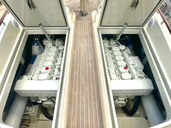  Yacht Photos Pics Engine compartment of a 2003 Riva RivaRama 44 yacht, showcasing dual engines.