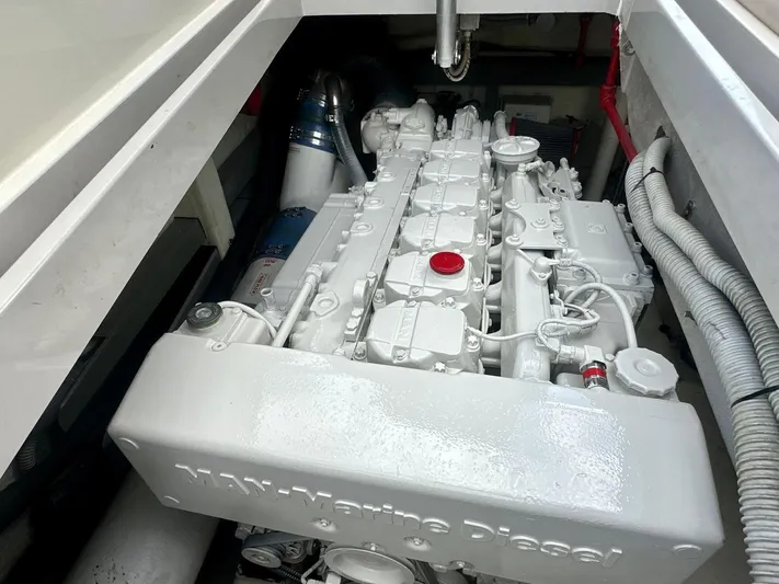  Yacht Photos Pics Engine compartment of 2003 Riva RivaRama 44, showcasing MAN marine diesel engine.