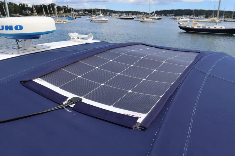 Cara Mia Yacht Photos Pics Solar panel on 2012 Tiara Yachts 3100 Coronet, docked in a scenic marina.