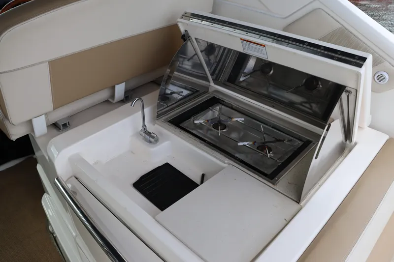 Cara Mia Yacht Photos Pics 2012 Tiara Yachts 3100 Coronet boat kitchen with stove and sink.