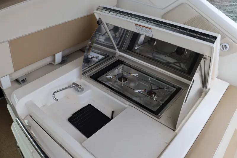 Cara Mia Yacht Photos Pics Outdoor kitchen on 2012 Tiara Yachts 3100 Coronet with stove and sink.