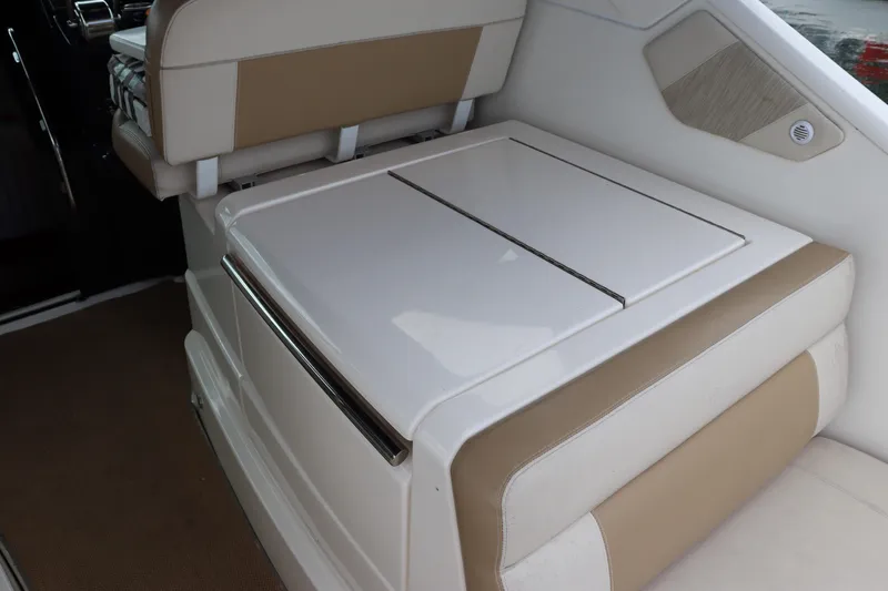 Cara Mia Yacht Photos Pics 2012 Tiara Yachts 3100 Coronet interior seating with beige and white upholstery.