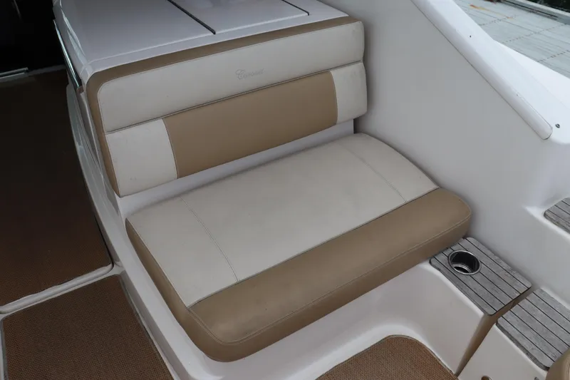 Cara Mia Yacht Photos Pics 2012 Tiara Yachts 3100 Coronet interior seating with beige and white upholstery.