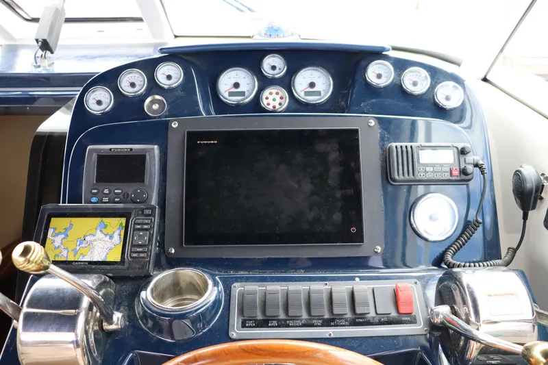 Cara Mia Yacht Photos Pics Dashboard of 2012 Tiara Yachts 3100 Coronet with navigation and control instruments.