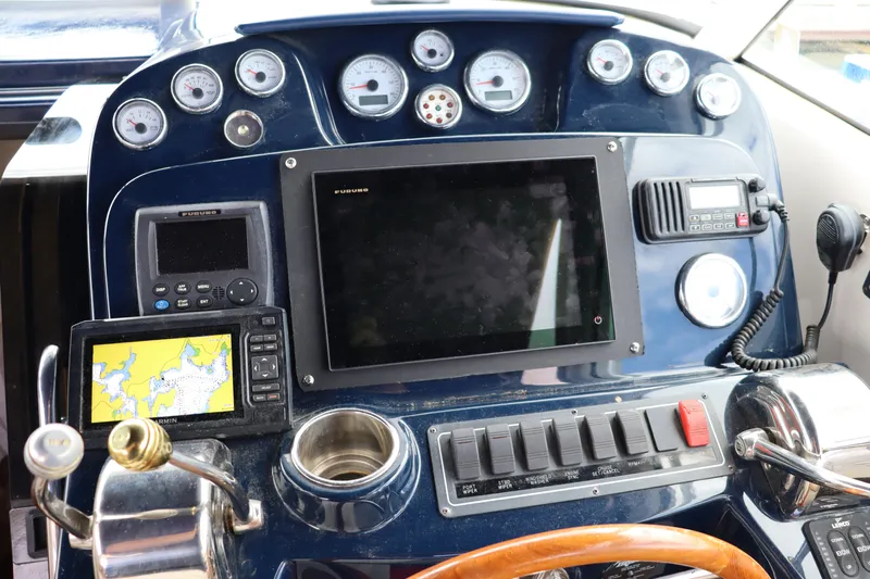 Cara Mia Yacht Photos Pics Dashboard of a 2012 Tiara Yachts 3100 Coronet with navigation and control instruments.