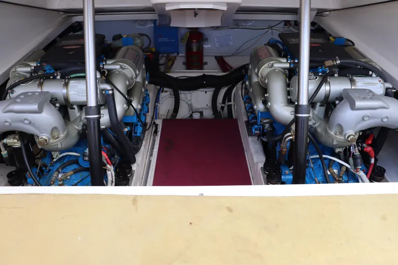 Cara Mia Yacht Photos Pics Engine compartment of a 2012 Tiara Yachts 3100 Coronet, featuring dual engines.