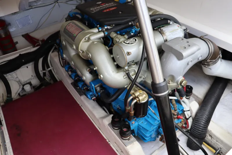 Cara Mia Yacht Photos Pics Engine compartment of 2012 Tiara Yachts 3100 Coronet, showcasing detailed mechanical components.