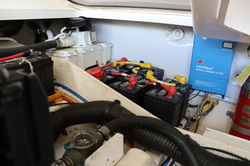 Cara Mia Yacht Photos Pics Engine compartment of a 2012 Tiara Yachts 3100 Coronet with batteries and charger.