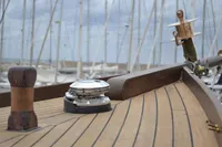 Wooden deck of a 1935 Matthiesen & Paulsen SLOOP with nautical fittings.