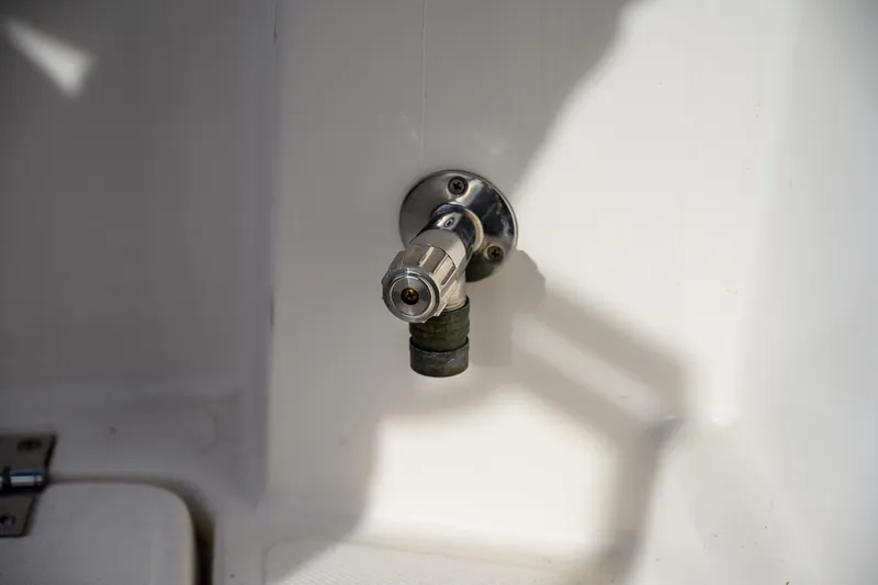  Yacht Photos Pics Stainless steel valve on Aspen C90 boat, 2012 model, against white background.