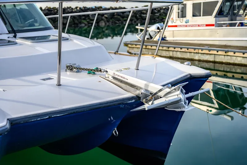  Yacht Photos Pics 2012 Aspen C90 boat docked with anchor and chain visible.