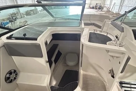  Yacht Photos Pics 2021 Sea Ray SLX 310 boat interior with seating and helm station.