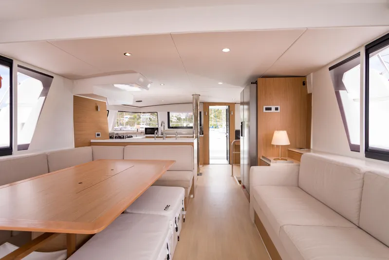Tikka Yacht Photos Pics Luxurious interior of 2024 Bali 4.6 yacht with modern furnishings and ample natural light.