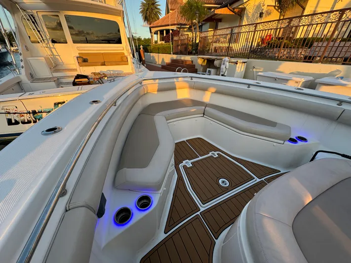  Yacht Photos Pics 2017 Boston Whaler 370 Outrage boat with spacious seating and elegant deck lighting.