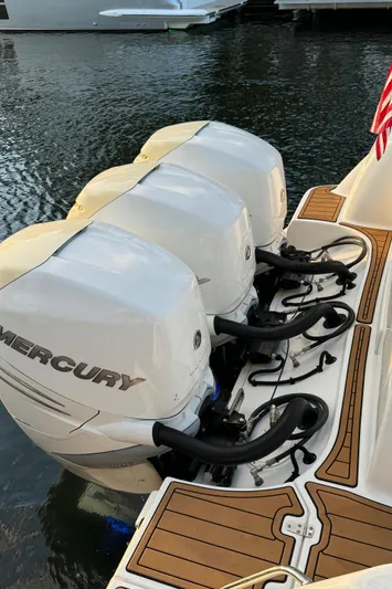  Yacht Photos Pics 2017 Boston Whaler 370 Outrage with triple Mercury outboard engines on water.