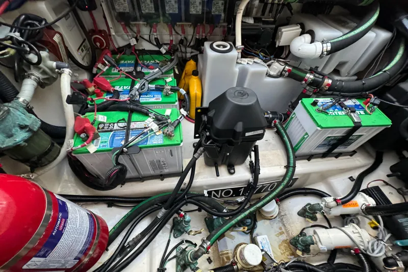  Yacht Photos Pics Engine compartment of a 2017 Boston Whaler 370 Outrage with batteries and wiring.