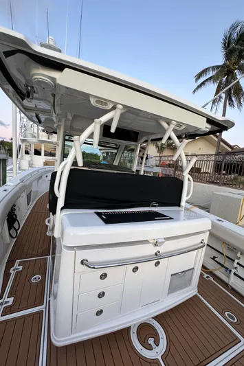  Yacht Photos Pics 2017 Boston Whaler 370 Outrage boat with sleek deck and modern amenities.