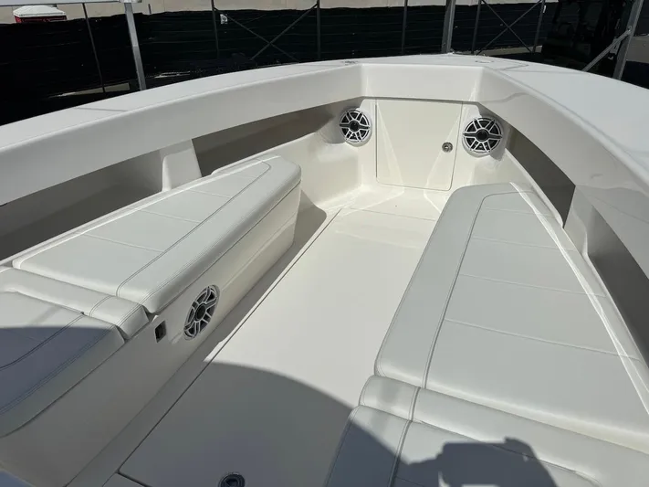  Yacht Photos Pics 2024 SeaVee 340Z boat interior with white seating and speakers.