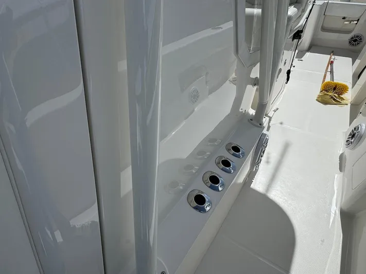  Yacht Photos Pics 2024 SeaVee 340Z boat interior with rod holders and clean white deck.