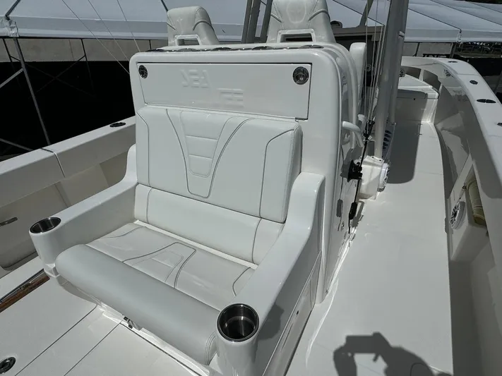  Yacht Photos Pics 2024 SeaVee 340Z boat interior with white seating and cup holders.