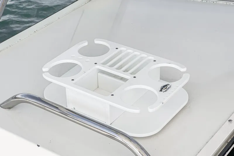 Jesses Girl Yacht Photos Pics White cup holder on 2005 Carolina Classic 28 boat deck.