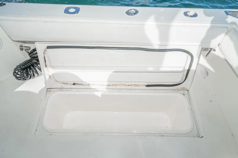 Jesses Girl Yacht Photos Pics Open storage compartment on a 2005 Carolina Classic 28 boat.