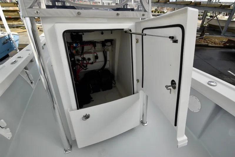  Yacht Photos Pics Open storage compartment in 2023 Pair Customs 24 Deep V boat.