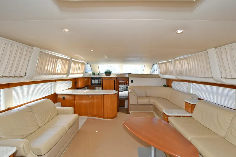  Yacht Photos Pics Luxurious interior of 2001 Carver 466 Motor Yacht with elegant seating and modern amenities.