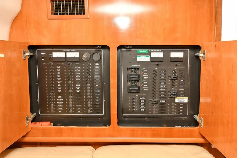  Yacht Photos Pics Electrical control panels inside 2001 Carver 466 Motor Yacht, featuring AC and DC systems.