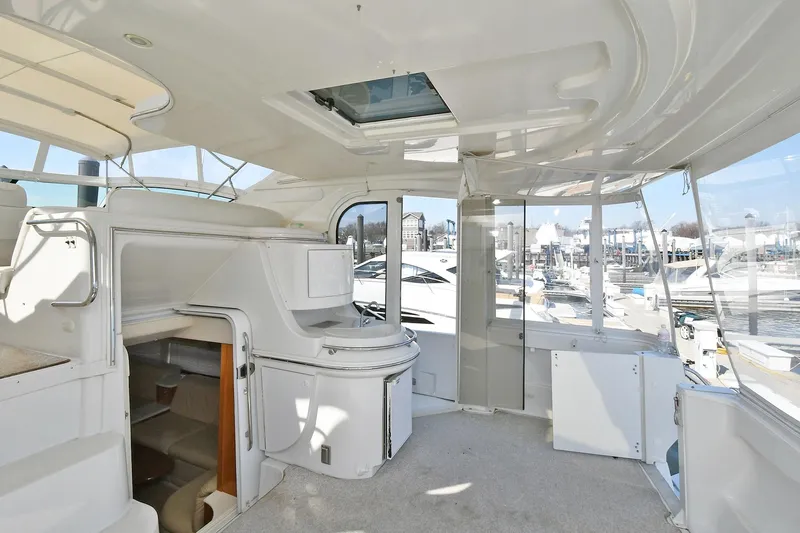  Yacht Photos Pics 2001 Carver 466 Motor Yacht interior with spacious seating and panoramic marina views.