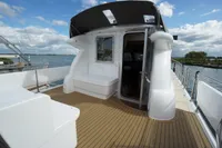 2004 Elling E3 Ultimate yacht deck with seating, open water view, and sleek design.