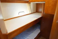 Bunk beds in 2004 Elling E3 Ultimate yacht cabin with wooden interior.