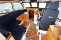 Interior of 2004 Elling E3 Ultimate yacht with seating and navigation area.