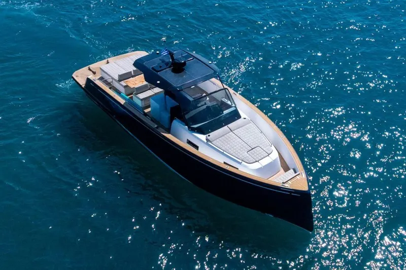 M/y Fizzy Yacht Photos Pics Luxury 2021 Pardo 43 yacht cruising on sparkling blue ocean waters.