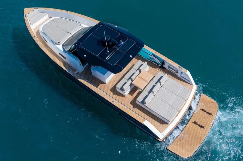M/y Fizzy Yacht Photos Pics Aerial view of 2021 Pardo 43 luxury yacht cruising on blue water.
