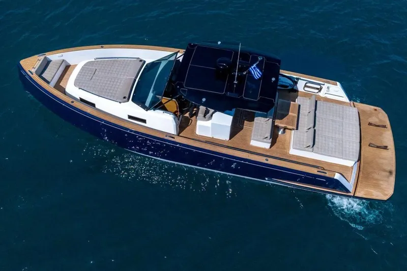 M/y Fizzy Yacht Photos Pics 2021 Pardo 43 luxury yacht cruising on open water, featuring sleek design and spacious deck.
