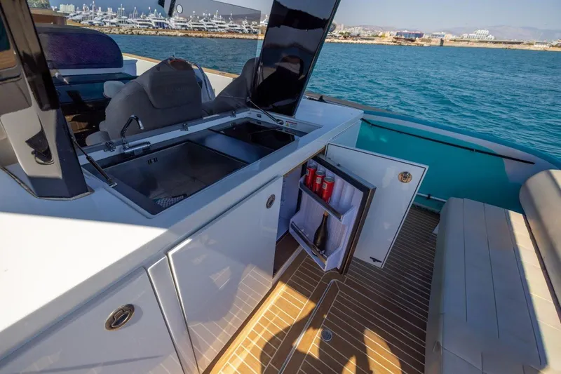 M/y Fizzy Yacht Photos Pics Luxury Pardo 43 yacht interior with open mini-fridge and sink, 2021 model.