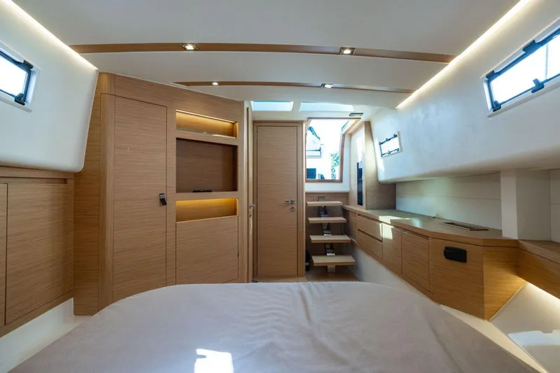 M/y Fizzy Yacht Photos Pics Luxurious interior of 2021 Pardo 43 yacht with modern wood finishes and ample natural light.
