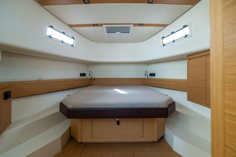 M/y Fizzy Yacht Photos Pics Luxurious cabin interior of 2021 Pardo 43 yacht with modern wood finish.